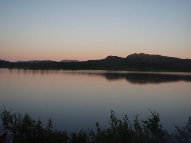 solnedgång i kvarntjärn